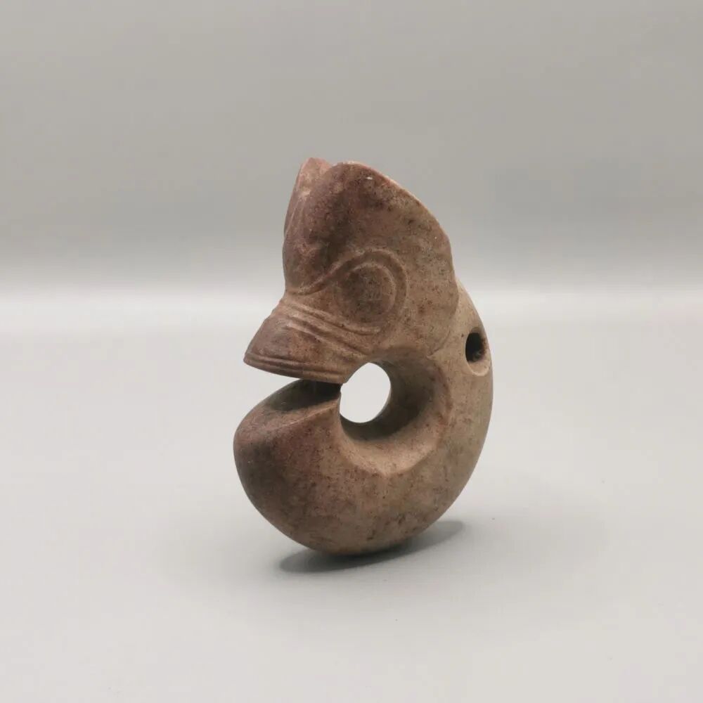 遗址一号冢出土玉龙。(中国社科院供图) 遗址一号冢出土玉龙。(中国社科院供图)